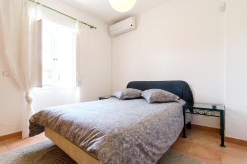 3 bedrooms house with shared pool enclosed garden and wifi at Vilamoura 3 km away from the beach