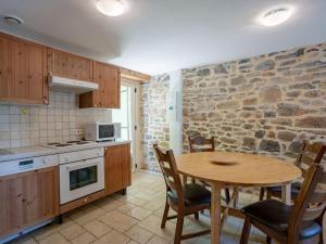 3 cottages around a swimming pool in a small village