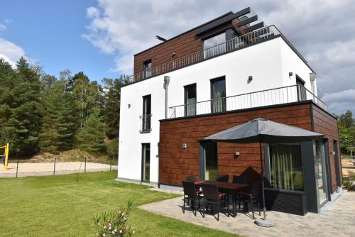 5 Sterne-Ferienhaus-See-Sauna-Kamin-Garten im Naturpark