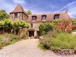 A romantic hamlet with lush gardens on a hill