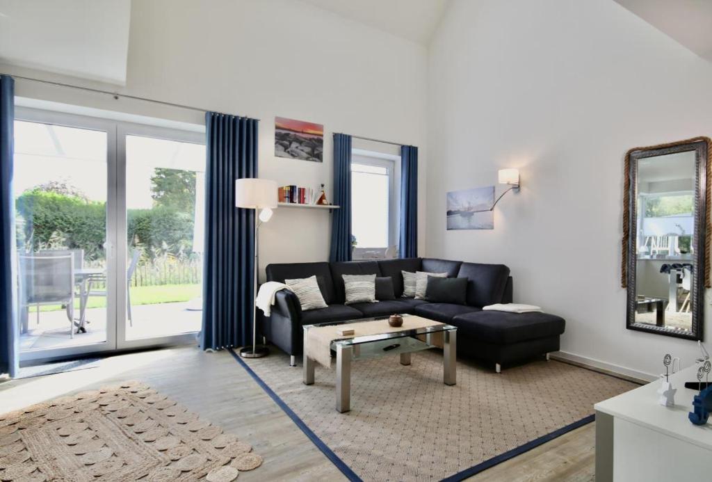 Maison de vacances Am Kutterhafen 18a - Das Blaue Haus Am Kutterhafen 18a 26969 Fedderwardersiel