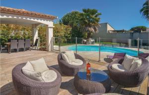 Amazing home in Aigues-Mortes with 4 Bedrooms, WiFi and Outdoor swimming pool
