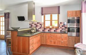 Amazing home in Allas with 4 Bedrooms, WiFi and Outdoor swimming pool