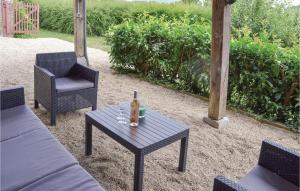Amazing home in Boure with 3 Bedrooms, Outdoor swimming pool and WiFi
