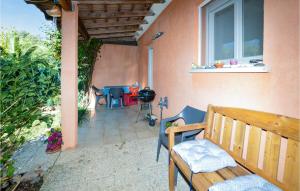 Amazing home in Cervione with 1 Bedrooms and Outdoor swimming pool