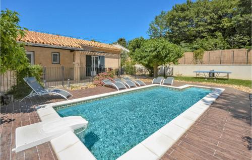 Amazing home in Eyragues with 4 Bedrooms, WiFi and Outdoor swimming pool