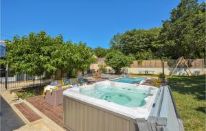 Amazing home in Eyragues with 4 Bedrooms, WiFi and Outdoor swimming pool