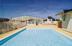 Amazing home in Grandcamp Maisy with 3 Bedrooms, WiFi and Outdoor swimming pool