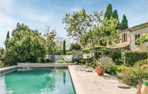 Amazing home in Graveson with Outdoor swimming pool, WiFi and 4 Bedrooms