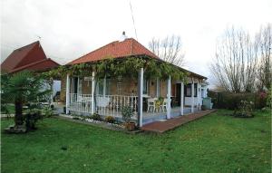 Amazing home in Houlle with 2 Bedrooms and Internet