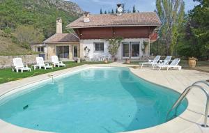 Amazing home in La Bastide with 5 Bedrooms and Outdoor swimming pool
