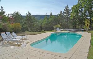 Amazing home in La Bastide with 5 Bedrooms and Outdoor swimming pool