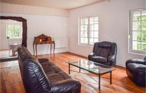 Amazing home in La Roche Jaudy with 3 Bedrooms and WiFi