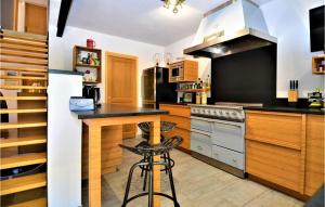 Amazing home in Lafare with Outdoor swimming pool, WiFi and 3 Bedrooms