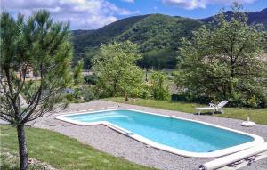 Amazing home in Le Poujol sur Orb with 2 Bedrooms, Private swimming pool and Outdoor swimming pool
