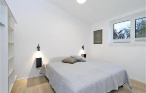 Amazing home in Lembruch-Dmmer See with 2 Bedrooms, Sauna and Indoor swimming pool