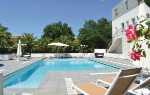 Amazing home in Moriani Plage with 3 Bedrooms, WiFi and Outdoor swimming pool