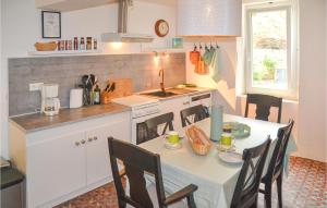 Amazing home in Saint-Gervais-sur-Mare with 2 Bedrooms