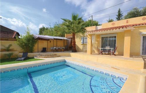 Amazing home in Thziers with 4 Bedrooms, WiFi and Outdoor swimming pool