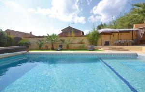 Amazing home in Thziers with 4 Bedrooms, WiFi and Outdoor swimming pool