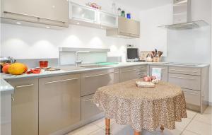 Amazing home in Uchaud with 4 Bedrooms, WiFi and Outdoor swimming pool