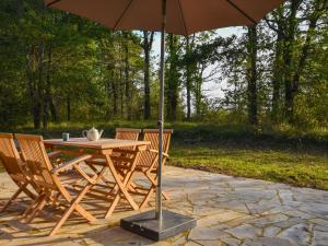 Ancient dovecote renovated in the heart of a forest near Belv s