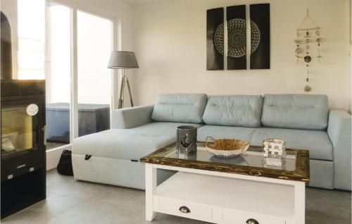 Awesome home in Breege-Juliusruh with 2 Bedrooms, Sauna and WiFi