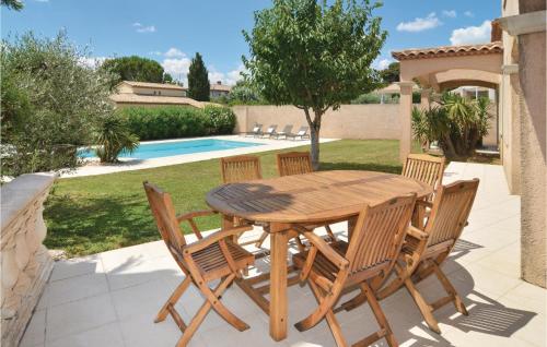 Awesome home in Calvisson with 4 Bedrooms, WiFi and Swimming pool