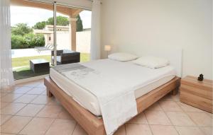 Awesome home in Calvisson with 4 Bedrooms, WiFi and Swimming pool