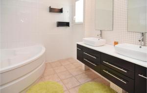 Awesome home in Calvisson with 4 Bedrooms, WiFi and Swimming pool