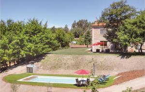 Awesome home in Celeiro do Monte with 4 Bedrooms, WiFi and Outdoor swimming pool
