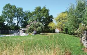 Awesome home in Coulonges sur lAutize with 4 Bedrooms, Outdoor swimming pool and WiFi