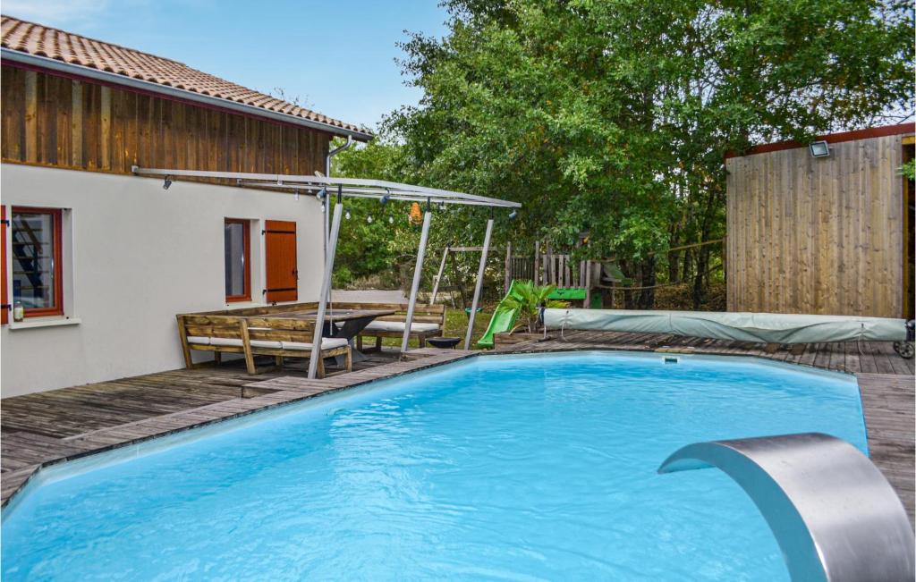 Awesome home in Garein with Outdoor swimming pool and 4 Bedrooms , 40420 Garein