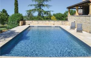 Awesome home in Gindou with 5 Bedrooms, WiFi and Outdoor swimming pool