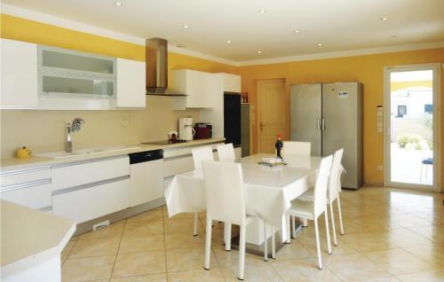 Awesome home in Grau dAgde with 4 Bedrooms, WiFi and Outdoor swimming pool