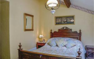 Awesome home in Guern with 3 Bedrooms and WiFi
