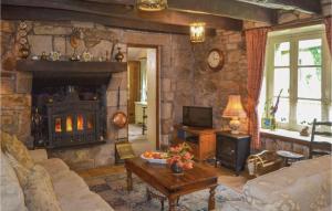 Awesome home in Guern with 3 Bedrooms and WiFi