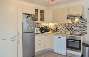 Awesome home in Hermanville-sur-mer with WiFi and 2 Bedrooms