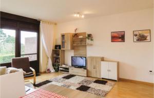 Awesome home in Holtgast-Utgast with 2 Bedrooms and WiFi