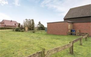 Awesome home in Holtgast-Utgast with 2 Bedrooms and WiFi