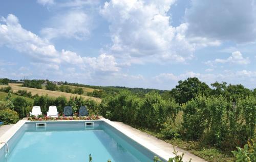 Awesome home in La-Chapelle-Saint-Jean with 3 Bedrooms and Outdoor swimming pool