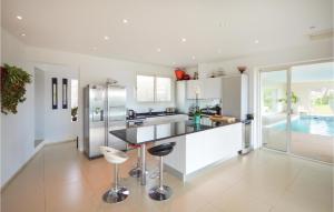 Awesome home in La Gaude with 4 Bedrooms, Indoor swimming pool and Swimming pool