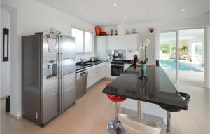 Awesome home in La Gaude with 4 Bedrooms, Indoor swimming pool and Swimming pool