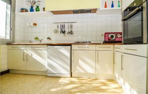 Awesome home in Meynes with 2 Bedrooms and WiFi