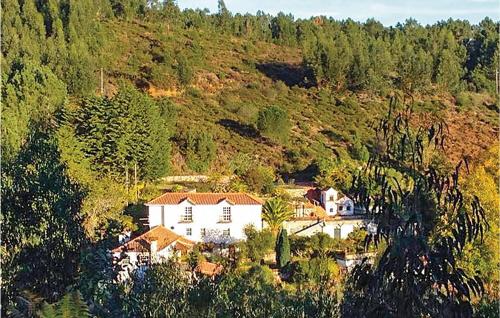 Awesome home in Pedrgo Grande with 4 Bedrooms, WiFi and Swimming pool