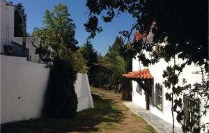 Awesome home in Pedrgo Grande with 4 Bedrooms, WiFi and Swimming pool