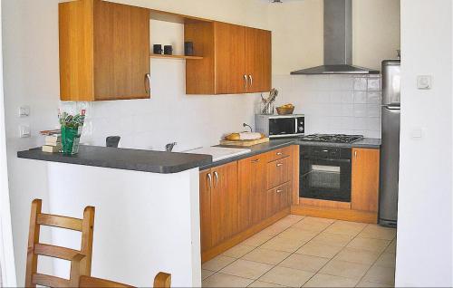 Awesome home in Pomas with 3 Bedrooms and Outdoor swimming pool