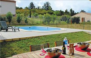 Awesome home in Pomas with 3 Bedrooms and Outdoor swimming pool