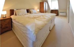 Awesome home in Port-en-Bessin-Huppain with 4 Bedrooms and WiFi