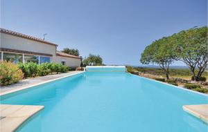 Awesome home in Poulx with 5 Bedrooms, WiFi and Outdoor swimming pool